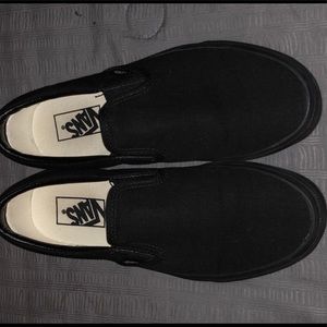 Black slip-on Vans